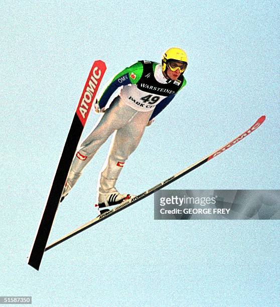 Austrian Wolfgang Loitzl flies through the air during his second jump in the individual K120 ski Jump at the FIS World Cup Ski-Jumping at the Utah...