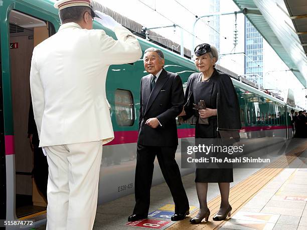 Emperor Akihito and Empress Michiko prepare to board a Shinkansen at JR Tokyo Station on March 16, 2016 in Tokyo, Japan. The imperial couple visit...