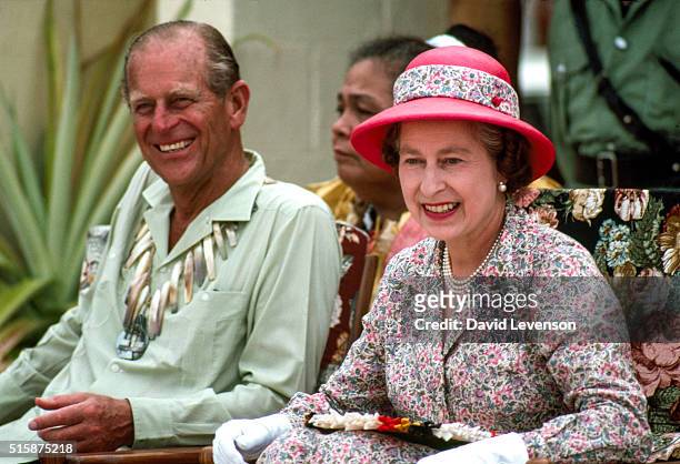 The Queen And Prince Philip Laughing Together On A Visit To Tuvalu In The South Pacific.
