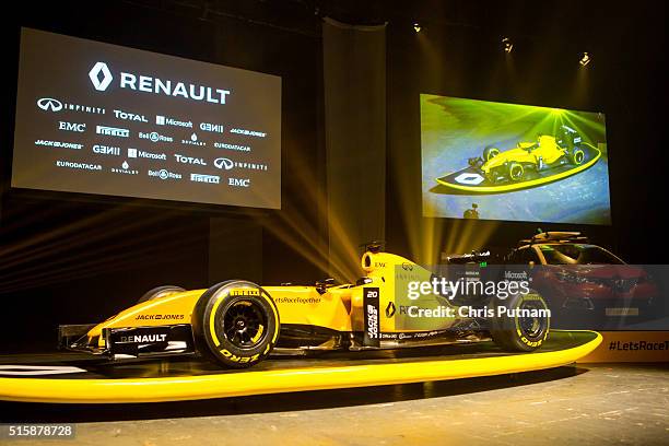 Renault F1 boss Cyril Abiteboul and David Croft discuss the new 2016 Reanault F1 team livery on March 16, 2016 in Melbourne, Australia.