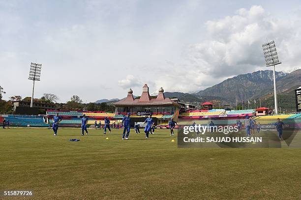 The Australian cricket team takes part in a practice session at The Himachal Pradesh Cricket Association Stadium in Dharamsala on March 16,2016....