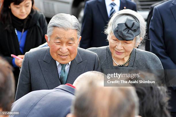 Emperor Akihito and Empress Michiko talk to evacuees from Katsurao village, designated as no-go zone of the crippled Fukushima Daiichi Nuclear Power...