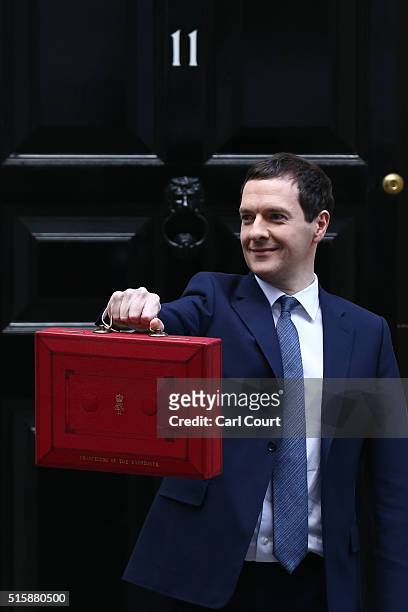 Chancellor of the Exchequer George Osborne holds his ministerial red box up to the media as he leaves 11 Downing Street on March 16, 2016 in London,...