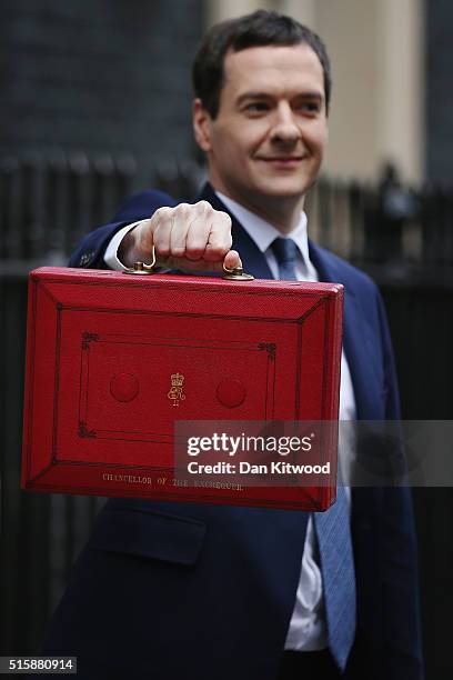 British Chancellor of the Exchequer, George Osborne holds the Budget Box outside 11 Downing Street on March 16, 2016 in London, England. Today's...