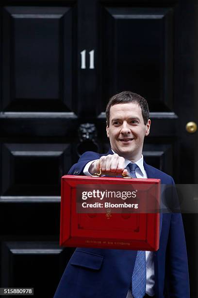 George Osborne, U.K. Chancellor of the exchequer, holds the dispatch box containing the budget, as he exits 11 Downing Street in London, U.K., on...