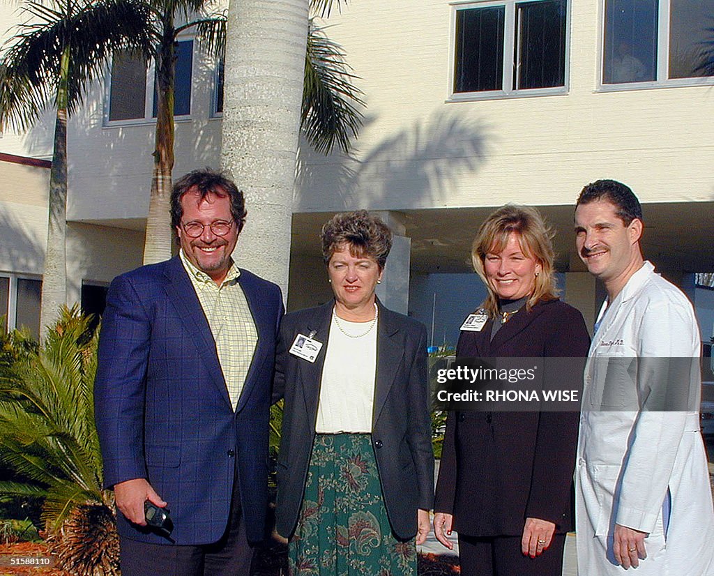 Staff members of the Palms West Medical Center pos