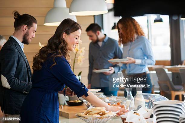 business people at lunch - holiday event stockfoto's en -beelden