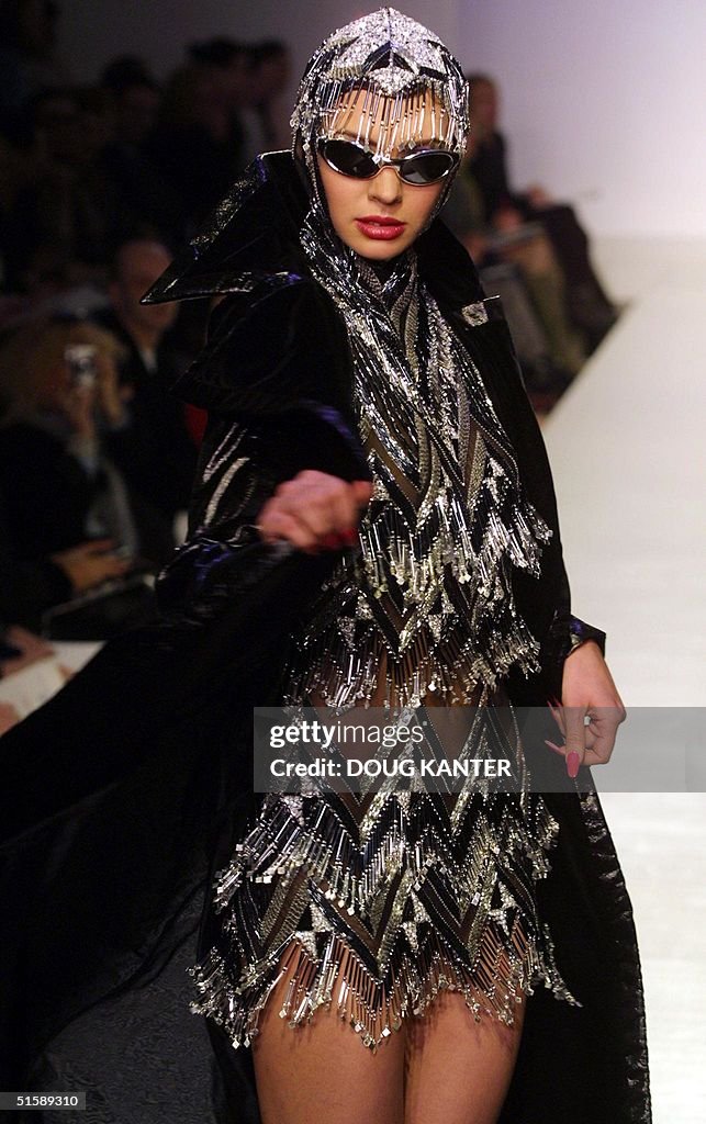 A model presents a black silver and gunmetal beade
