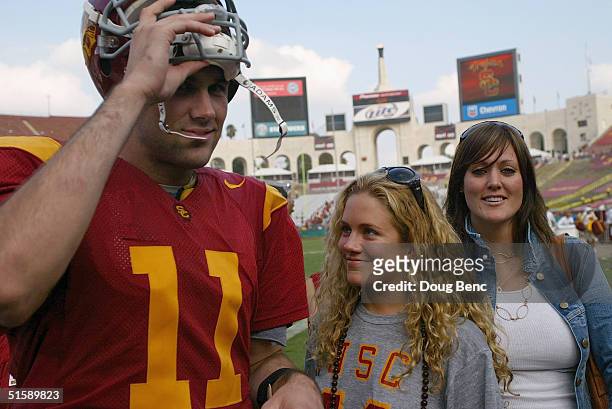 Quarterback Matt Leinart of the USC Trojans stands on the field after the game with the Arizona State Sun Devils at the Los Angeles Coliseum on...