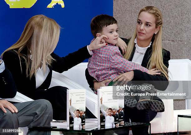Cristina Cifuentes , Lilian Tintori and her son attend the presentation of Leopoldo Lopez's book 'Imprisoned But Free' at Madrid Goverment...