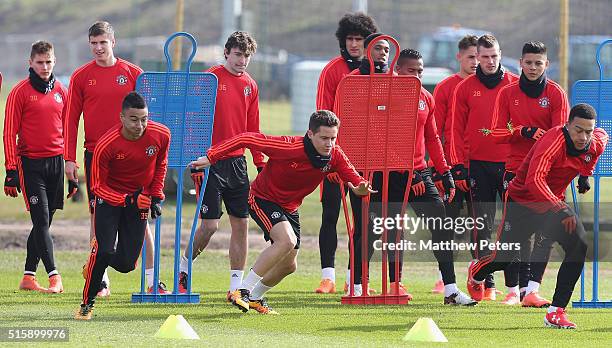 Jesse Lingard, Ander Herrera and Memphis Depay of Manchester United in action during a first team training session, ahead of their UEFA Europa League...