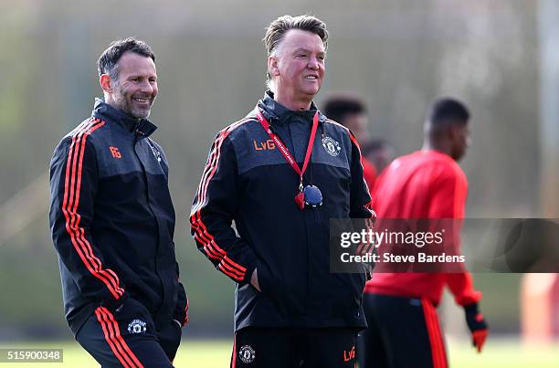 Louis van Gaal Manager of Manchester United watches training alongside Ryan Giggs, Assistant Managed of Manchester United during a training session...