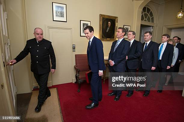 Chancellor of the Exchequer George Osborne leaves 11 Downing Street with his treasury team Lord O'Neill, Damian Hinds, David Gauke, Chris Skidmore,...