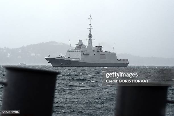 The 3rd FREMM "Languedoc" sails during the acceptation ceremony by the OCCAR on March 16, 2016 in Toulon. / AFP / BORIS HORVAT