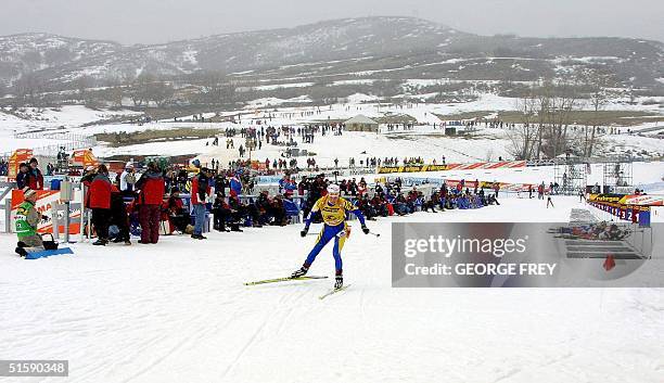 Magdalena Forsberg from Sweden moves through the shooting area at the Ruhrgas World Cup Women's Biathlon at Solider Hollow outside of Midway, Utah 03...