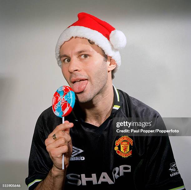 Ryan Giggs of Manchester United enjoying a lollipop, circa December 1998.