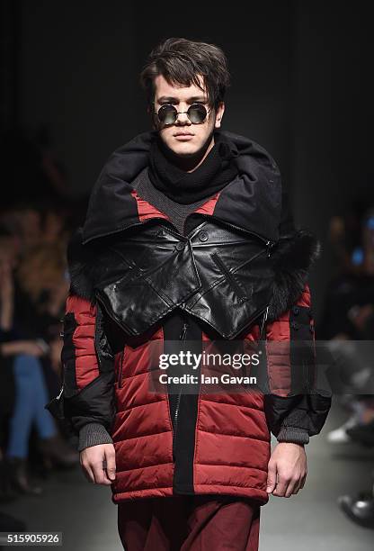 Model walks the runway at the Safak Tokur show during the Mercedes-Benz Fashion Week Istanbul Autumn/Winter 2016 at Zorlu Center on March 16, 2016 in...