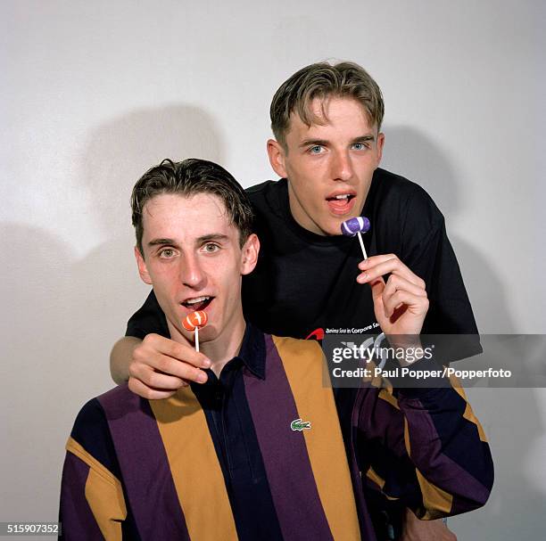 Manchester United's footballing brothers Gary and Phil Neville enjoying their lollipops, circa 1994.