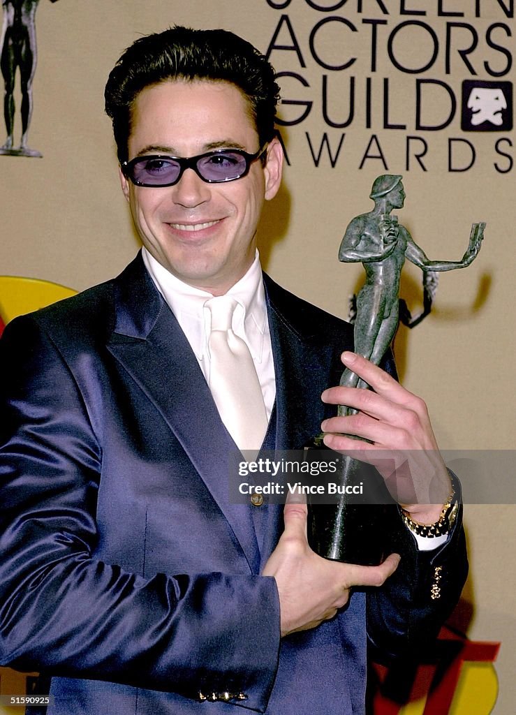 Rd Jr US actor Robert Downey Jr., poses backstage with his award for... News ...