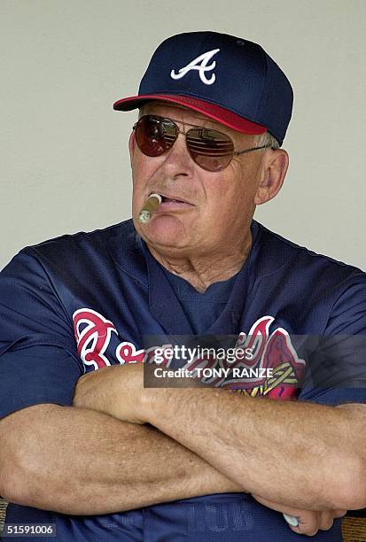 winter-haven-united-states-atlanta-braves-manager-bobby-cox-smokes-a-cigar-in-the-dugout-during.jpg