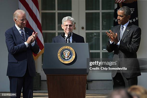 President Barack Obama and Vice President Joe Biden stands with Judge Merrick B. Garland , while nominating him to the US Supreme Court, in the Rose...