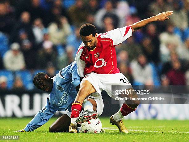 Jermaine Pennant of Arsenal battles for the ball with Shaun Wright-Phillips of Manchester City during the Carling Cup , Third Round match between...