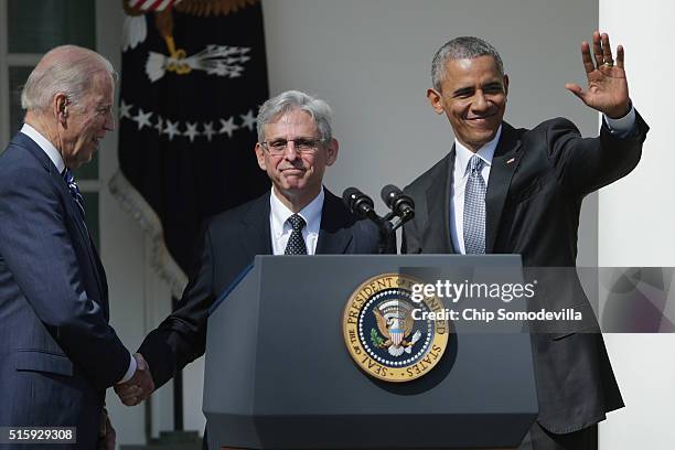President Barack Obama and Vice President Joe Biden stand with Judge Merrick Garland, the president's nominee to replace the late Supreme Court...