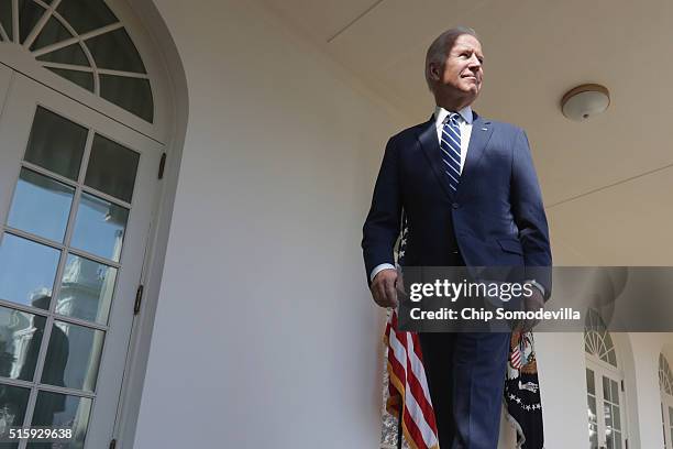 Vice President Joe Biden leaves the Rose Garden after President Barack Obama announced Judge Merrick Garland to be his nominee to replace the late...