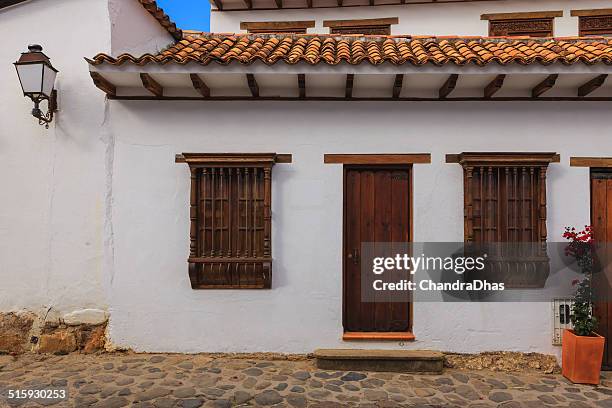 villa de leyva, colombia - colonial architecture: door and windows - spanish-colonial-architecture stock pictures, royalty-free photos & images