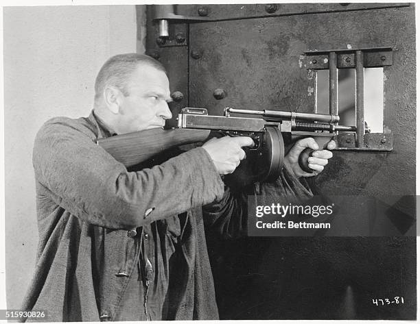 Wallace Beery is shown in The Big House, a MGM production which was directed by George Hill.