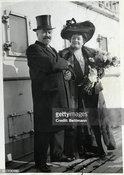 Picture shows producer, Oscar Hammerstein, and Grand opera singer, Mme Letrazin, in a full length photo on board a ship. Undated photo.
