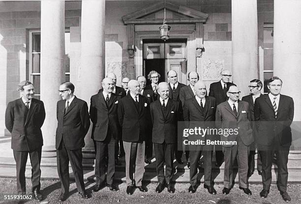 Northern Ireland Prime Minister Brian Faulkner and his fellow Ulster government officials stand before Stormont Castle on March 29 after resigning...