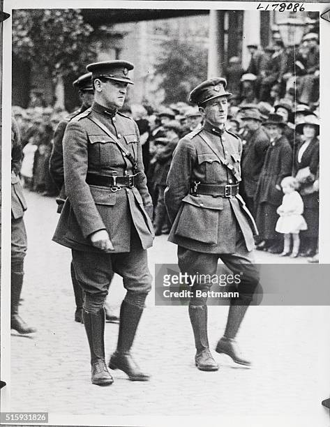 Irish president and Army commander Michael Collins walks with Richard Mulcahy behind the coffin of assassinated president Arthur Griffith on August...