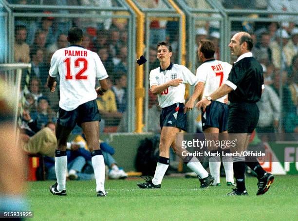 June 1992 Stockholm European Football Championships - England v Sweden - England captain Gary Lineker throws the armband to Carlton Palmer after...