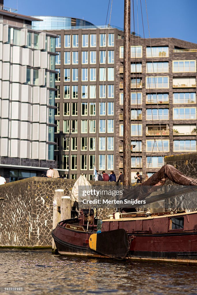 Tjalk sailing ship at modern Oosterdock