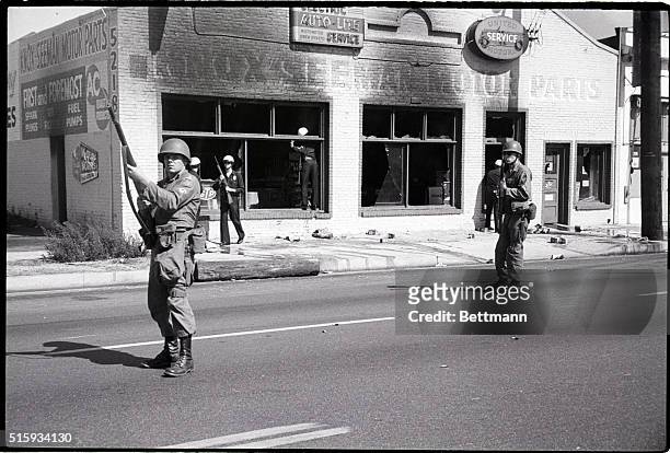 Los Angeles, CA: National guardmen move down Avalon Blvd. As they began a "Major Sweep" to seal off a 200 square block area as new looting, violence...