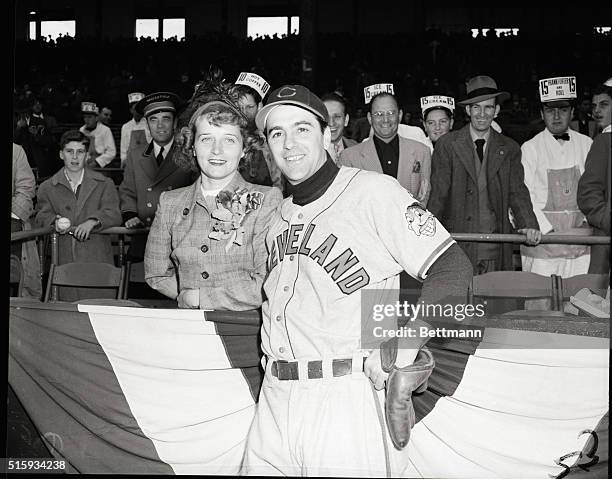 Boston, MA: Manager Lou Boudreau of the Cleveland Indians is shown with his wife before the start of the first World Series game of 1948 against the...