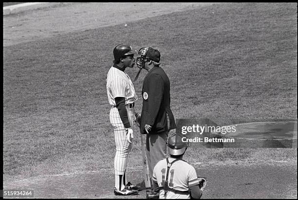 New York, NY: New York Yankees' Rickey Henderson goes nose to nose with home plate umpire Rick Garcia under the watchful eye of Brewers' catcher Rick...