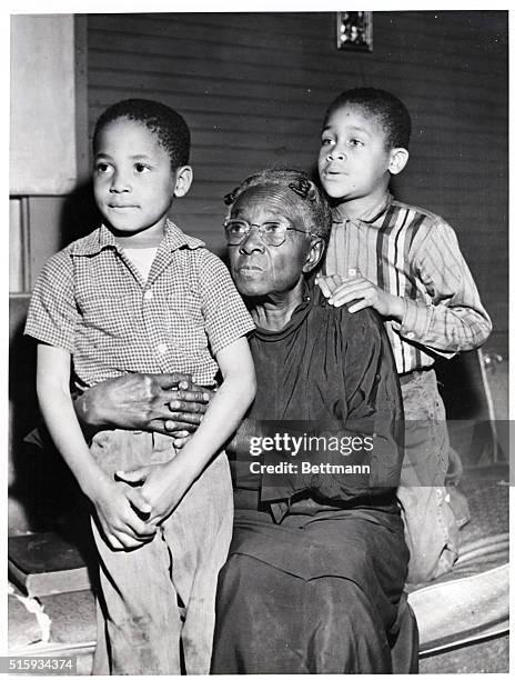 Rock Hill, SC: Maggie White the daughter of slaves, with two of her five grandchildren whom she supports through welfare. The boys are Laverne White...