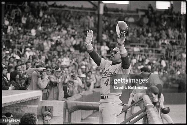 Chicago, IL: A long 21-season career comes to an end as Athletics' Reggie Jackson waves to cheering fans in Comiskey Park on his way to the dugout at...