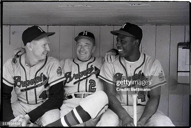 Atlanta Braves' players awaiting the start of the 1957 World Series. Players are Red Schaendienst, Fred Glaney, and Hank Aaron.