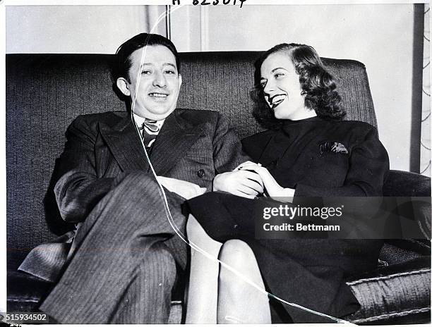 San Francisco, CA: A lovey-dovey pose of Billy Rose, impresario of things theatrical, and Mrs. Eleanor Holm Jarrett, former famous swim star and now...