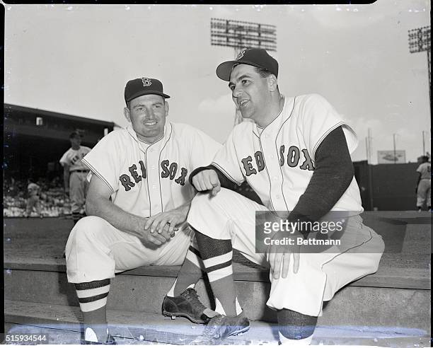 Boston, Massachusetts: Manager Lou Boudreau of the Boston Red Sox welcomes Geroge Kell to his his club before their game with the Cleveland Indians...