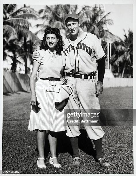 Miami, FL- Hank Greenberg, 1946 home run king who will open the season at first base for the Pittsburgh Pirates, is pictured with his wife, the...