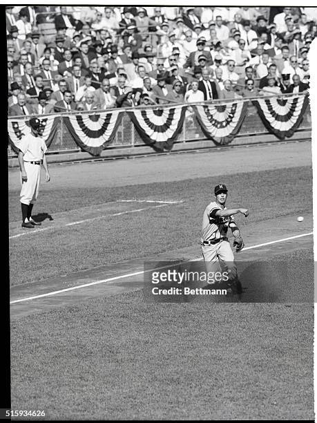 New York, NY: Yankee Stadium- Eddie Mathews of the Milwaukee Braves pictured thowing out Garry Coleman at first in the second inning of seventh game...