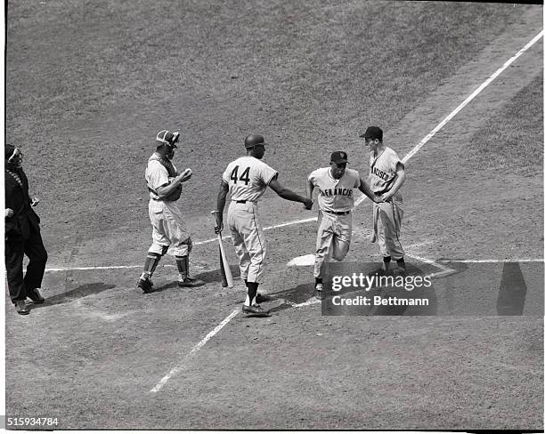 Chicago, IL: Willie Mays of the Giants crosses home plate after driving the ball over the left field wall during the third inning of the game against...