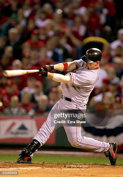 Trot Nixon of the Boston Red Sox hits a two run double against the St. Louis Cardinals in the third inning during game four of the World Series on...