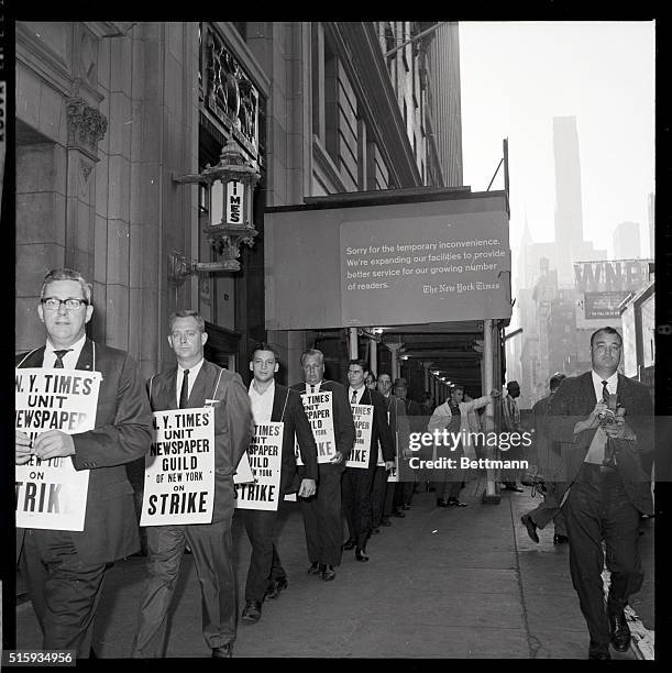 New York, NY- Pickets are on patrol in front of the New York Times building in New York early September 16th, after the American Newspaper Guild went...