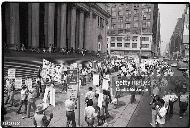 New York, New York- Post office workers carrying placards demonstrate outside the main Post Office at 34th Street and 8th Avenue as a potential,...