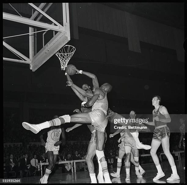 SAN FRANCISCO, CALIF.: WILT CHAMBERLAIN DID NOT TAKE TWP POINTS ON THIS PLAY IN 2ND PERIOD HERE 4/20. NATE THURMOND OF THE WARRIORS GUARDS WILT. THE...